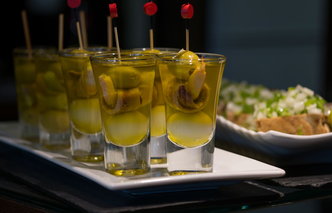 Basque pintxos served with olives and drinks